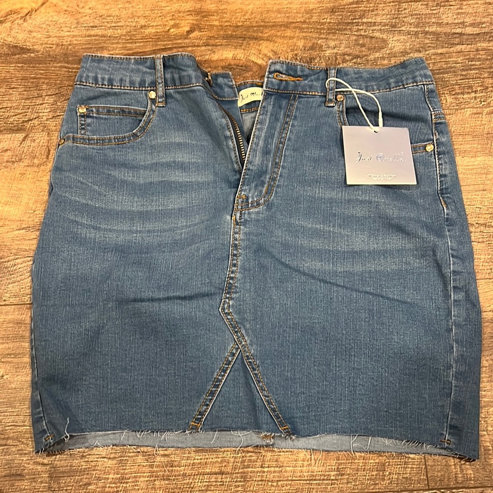 Jean skirt. New with tags! Size medium/8-10.